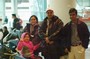 Keshore greets his family freshly arrived from India at Logan International Airport
